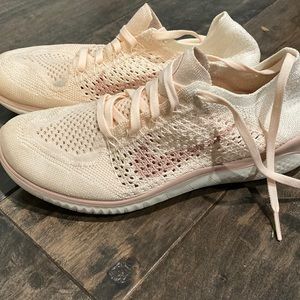 Rose gold nike flyknits